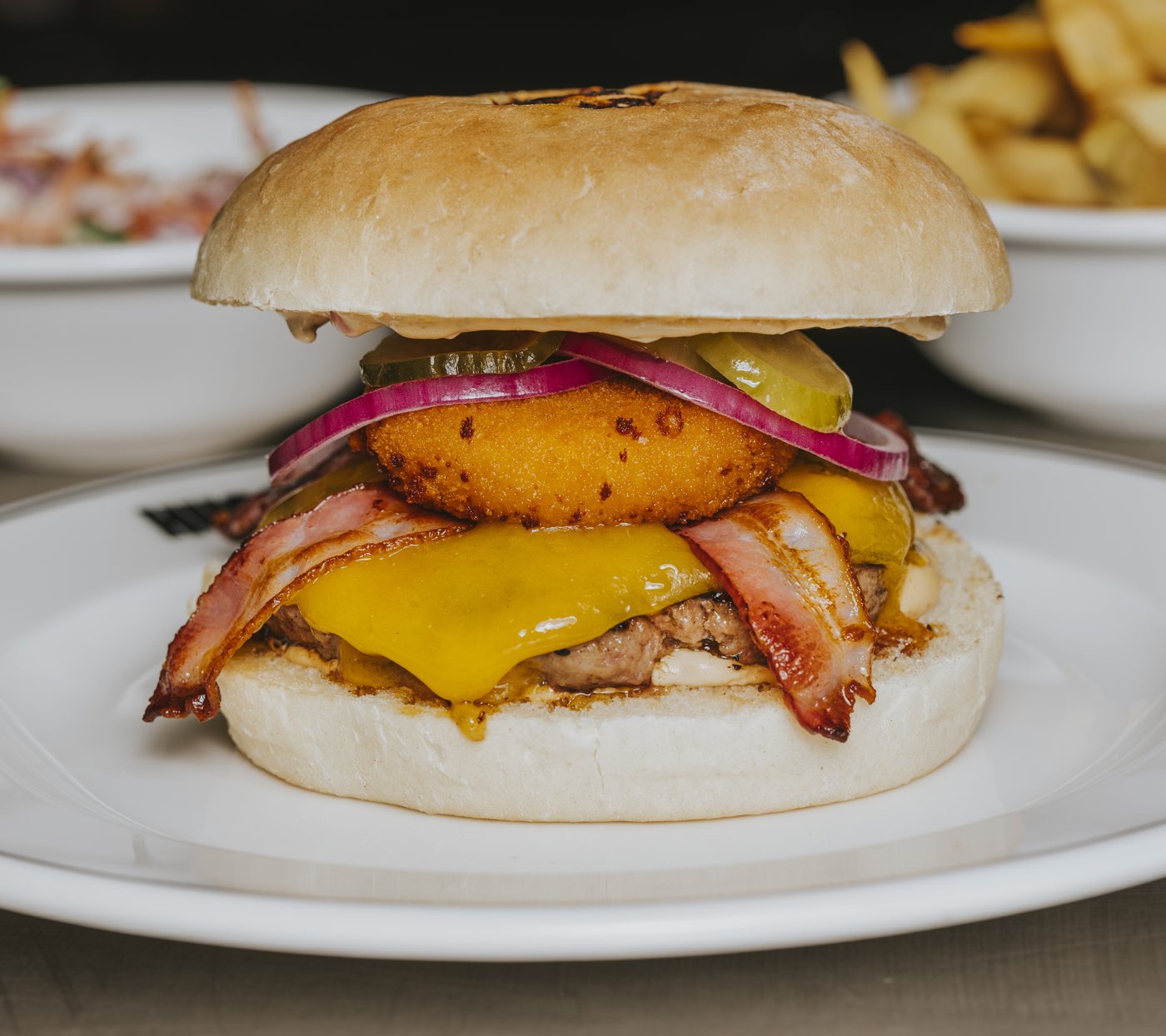 Le Magic Tom : croquette de fromage, cheddar, bacon et sauce poivre